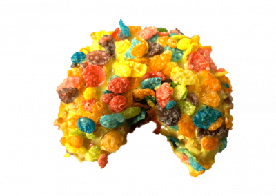 Lemon glazed donut crop dusted with fruity pebbles from Purvé Donut Stop Hawaii with a bite out of the side